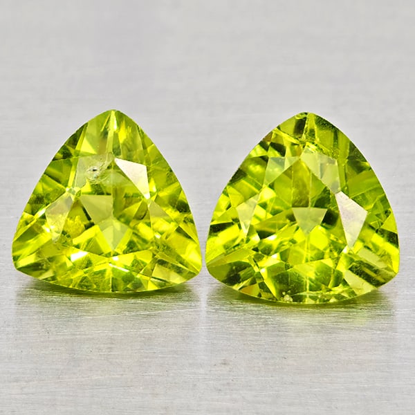 Natural Green Peridot Gemstones 1.52 Ct. 2 Pcs. Trilliant Shape 6 Mm.: Product ID: 805317558 Product Name: Natural Peridot Weight: 1.52 CT. Size: 6 x 6 x 3.9 MM. Shape: Trilliant Color: Green Clarity:SI1 Luster: Good Gems Origin: Pakistan Treatment: Unheated Crystal Stru