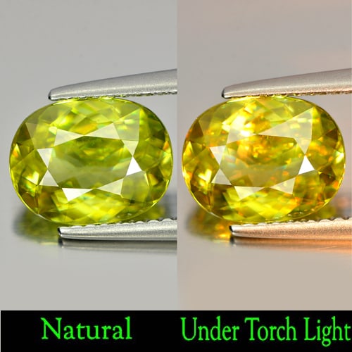 Natural Green Titanium With Rainbow Spark Sphene Gemstones 2.66 Ct. Oval 9.9 x 7.6 Mm.: Product ID: 806507730 Product Name: Natural Sphene Weight: 2.66 CT. Size: 9.9 x 7.6 x 4.2 MM. Shape: Oval Color: Intense Green With Rainbow Clarity:VSI Luster: Strong Iridescent Gems Origin: Madagasca
