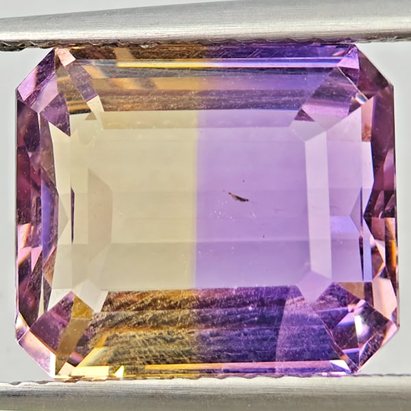Natural Bi Color Ametrine Gemstones 5.94 Ct. Octagon Shape 11.8 x 10.2 Mm.: Product ID: 800408638 Product Name: Natural Ametrine Weight: 5.94 CT. Size: 11.8 x 10.2 x 6.4 MM. Shape: Octagon Color: Bi Color Clarity:VSI Luster: Good Gems Origin: Bolivia Treatment: Unheated Cryst