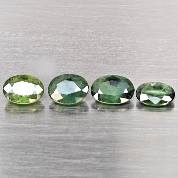 Natural Green Sapphire Gemstones 2.28 Ct. 4 Pcs. Oval Shape: Product ID: 806162990 Product Name: Natural Green Sapphire Weight: 2.28 CT. Size: 6.4 x 4.4 x 2.4 to 5.8 x 4 x 1.9 MM. Shape: Oval Shape Color: Green Clarity:SI1 Luster: Good Gems Origin: Thailand Tre