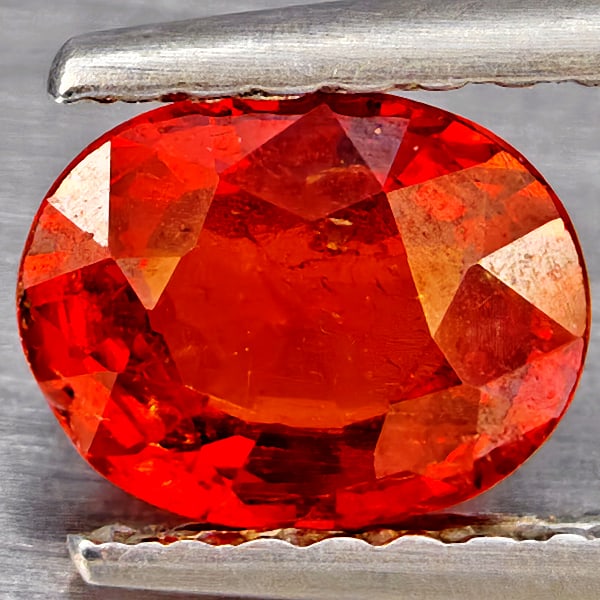 Natural Orangish Red Spessartine Garnet Gemstones 0.92 Ct. Oval Shape 6.5 x 5.2 Mm.: Product ID: 802937258 Product Name: Natural Garnet Weight: 0.92 CT. Size: 6.5 x 5.2 x 3.1 MM. Shape: Oval Shape Color: Orangish Red Clarity:SI1 Luster: Good Gems Origin: Namibia Treatment: Unheated Cr