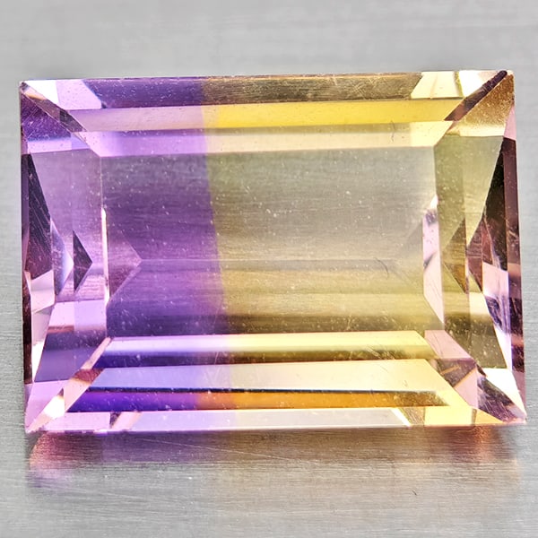 Natural Bi Color Ametrine Gemstones 3.64 Ct. Baguette Shape 11 x 8 Mm.: Product ID: 800408522 Product Name: Natural Ametrine Weight: 3.64 CT. Size: 11 x 8 x 5.3 MM. Shape: Baguette Color: Bi Color Clarity:VSI Luster: Good Gems Origin: Bolivia Treatment: Unheated Crystal S