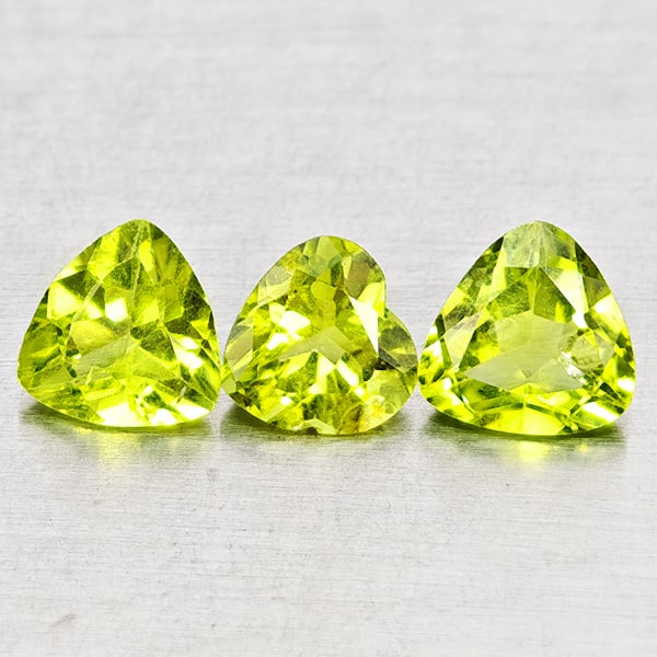 Natural Green Peridot Gemstones 2.16 Ct. 3 Pcs Heart Shape 5.7 x 5.7 Mm.: Product ID: 805317286 Product Name: Natural Peridot Weight: 2.16 CT. Size: 5.7 x 5.7 x 3.3 to 6.3 x 6.3 x 3.2 MM. Shape: Heart Shape Color: Green Clarity:VSI - SI1 Luster: Good Gems Origin: Pakistan T