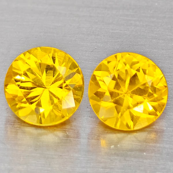 Natural Yellow Sapphire Gemstones 0.78 Ct. 2 Pcs. Round Dimond Cut 4.4 Mm.: Product ID: 806162960 Product Name: Natural Yellow Sapphire Weight: 0.78 CT. Size: 4.4 x 4.4 x 2.8 MM. Shape: Round Diamond Cut Color: Yellow Clarity:VSI Luster: Good Gems Origin: Thailand Treatment: 