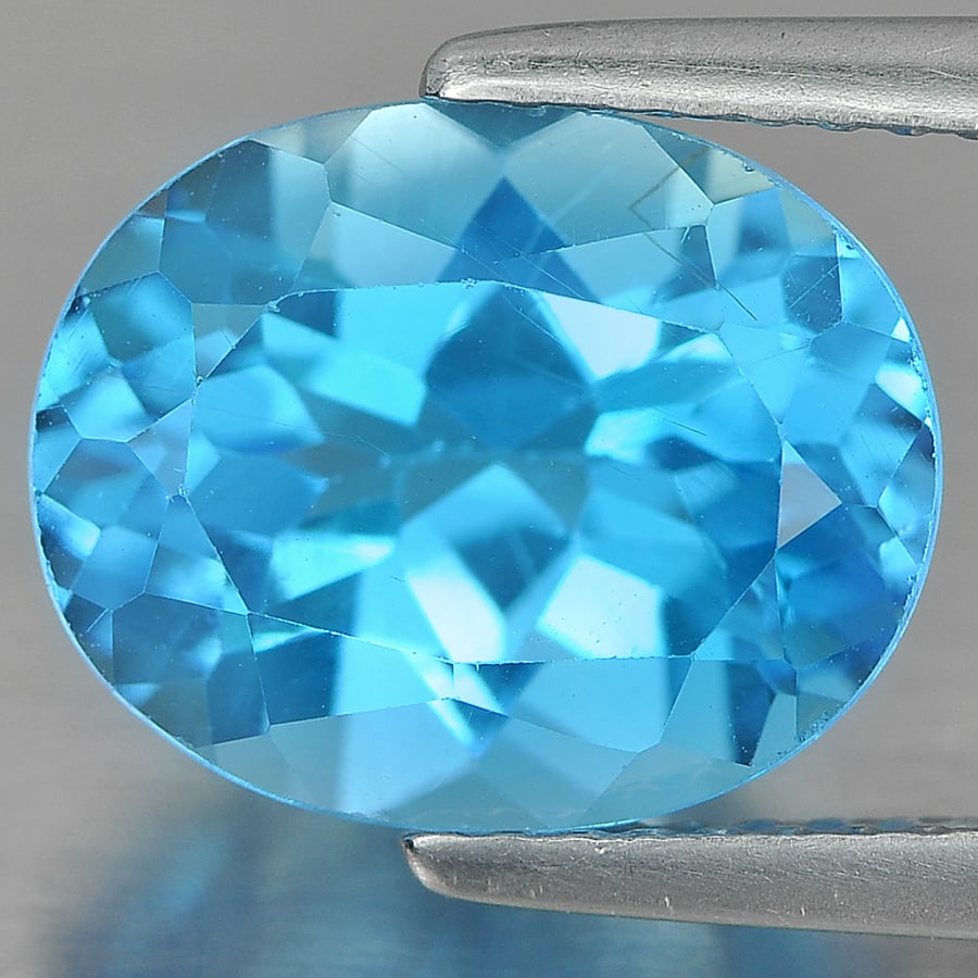Natural Swiss Blue Topaz Gemstones 4.68 Ct. Oval Shape 11 x 9 Mm.: Product ID: 807160584 Product Name: Natural Blue Topaz Weight: 4.68 CT. Size: 11 x 9 x 6.4 MM. Shape: Oval Color: Blue Clarity:VVS Luster: Good Gems Origin: Brazil Treatment: Treated Crystal Structure