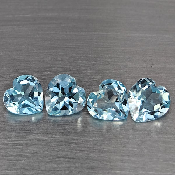 Natural Baby Blue Topaz Gemstones 3.30 Ct. 4 Pcs Heart Shape 6.4 Mm.: Product ID: 807168976 Product Name: Natural Blue Topaz Weight: 3.30 CT. Size: 6.4 x 6.4 x 3 MM. Shape: Heart Shape Color: Baby Blue Clarity:SI1 Luster: Good Gems Origin: Brazil Treatment: Treated Crys