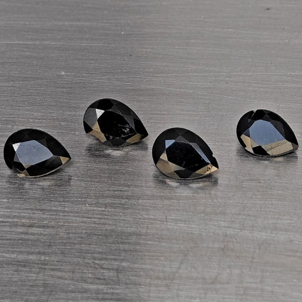 Natural Black Spinel Gemstones 3.27 Ct. 4 Pcs. Pear Shape 7.4 x 5.5 Mm.: Product ID: 806609913 Product Name: Natural Spinel Weight: 3.27 CT. Size: 7.4 x 5.5 x 3.5 MM. Shape: Pear Shape Color: Black Clarity:Opaque Luster: Good Gems Origin: Thailand Treatment: Unheated Cryst