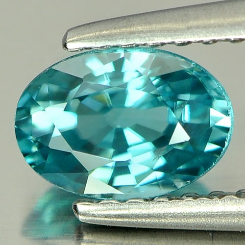 Natural Blue Color Zircon Gemstones 1.25 Ct. Oval Shape 6.9 x 4.9 Mm.: Product ID: 807710220 Product Name: Natural Zircon Weight: 1.25 CT. Size: 6.9 x 4.9 x 3.7 MM. Shape: Oval Color: Blue Clarity:VSI Luster: Good Gems Origin: Cambodia Treatment: Heated Crystal Structure