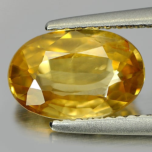 Natural Yellow Color Zircon Gemstones 2.77 Ct. Oval Shape 10 x 6.7 Mm.: Product ID: 807729505 Product Name: Natural Zircon Weight: 2.77 CT. Size: 10 x 6.7 x 3.7 MM. Shape: Oval Color: Yellow Clarity:VSI Luster: Good Gems Origin: Cambodia Treatment: Heated Crystal Structur