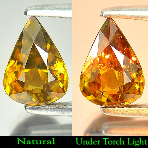Natural Multi Color Titanium Sphene Rainbow Spark Gemstones 1.47 Ct. Pear Shape 9 x 6.3 Mm.: Product ID: 806507742 Product Name: Natural Sphene Weight: 1.47 CT. Size: 9 x 6.3 x 4.2 MM. Shape: Pear Color: Multi-Color Clarity:VSI Luster: Strong Iridescent Gems Origin: Madagascar Treatment: Unhe