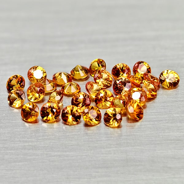 Natural Orange Songea Sapphire Gemstones 1.85 Ct. 29 Pcs. Round Diamond Cut: Product ID: 806162334 Product Name: Natural Orange Sapphire Weight: 1.85 CT. Size: 2.3 x 2.3 x 1.7 to 2.2 x 2.2 x 1.2 MM. Shape: Round Diamond Cut Color: Orange Clarity:VSI Luster: Very Good Gems Orig