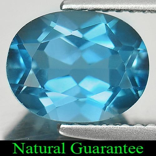 Natural London Blue Topaz Gemstones 2.59 Ct. Oval Shape Size 9 x 7 Mm.: Product ID: 807162643 Product Name: Natural Blue Topaz Weight: 2.59 CT. Size: 9 x 7 x 5 MM. Shape: Oval Color: Blue Clarity:VVS Luster: Good Gems Origin: Brazil Treatment: Treated Crystal Structure: O