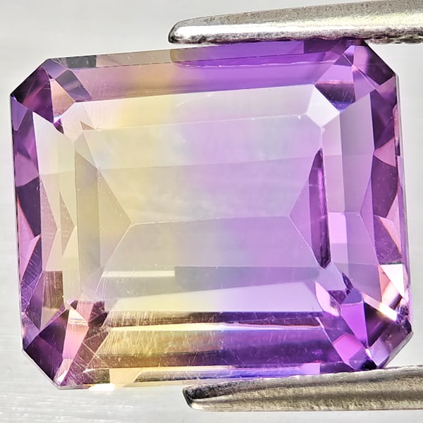 Natural Bi Color Ametrine Gemstones 4.52 Ct. Octagon Shape 10.6 x 9.3 Mm.: Product ID: 800408389 Product Name: Natural Ametrine Weight: 4.52 CT. Size: 10.6 x 9.3 x 5.9 MM. Shape: Octagon Color: Bi Color Clarity:VSI Luster: Good Gems Origin: Bolivia Treatment: Unheated Crysta