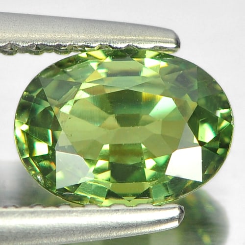 NaturalDemantoid Garnet Gemstones 0.93 Ct. Oval Shape 7.3 x 5.4 Mm.: Product ID: 802929792 Product Name: Natural Demantoid Weight: 0.93 CT. Size: 7.3 x 5.4 x 3.3 MM. Shape: Oval Color: Green Clarity:VS Luster: Very Good Gems Origin: Madagascar Treatment: Unheated Cryst