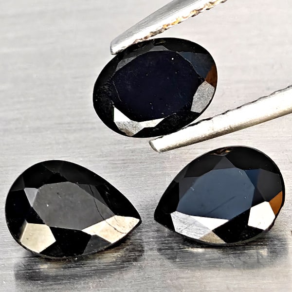 Natural Black Spinel Gemstones 2.69 Ct. 3 Pcs. Mixed Shape Gemstone: Product ID: 806609922 Product Name: Natural Spinel Weight: 2.69 CT. Size: 7.2 x 5.2 x 3.1 MM. Shape: Mixed Shape Color: Black Clarity:Opaque Luster: Good Gems Origin: Thailand Treatment: Unheated Crys