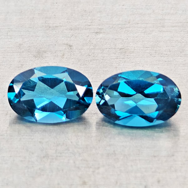Natural London Blue Topaz Gemstones 1.05 Ct. 2 Pcs. Oval Shape 6 x 4 Mm.: Product ID: 807168444 Product Name: Natural Blue Topaz Weight: 1.05 CT. Size: 6 x 4 x 2.9 MM. Shape: Oval Shape Color: London Blue Clarity:VSI - SI1 Luster: Good Gems Origin: Brazil Treatment: Treated