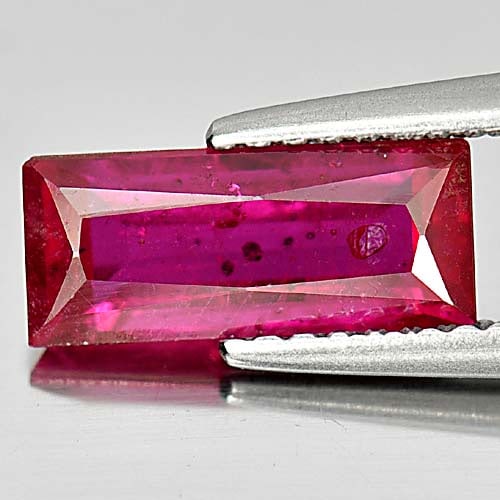 Natural Purplish Pink Ruby Gemstones 2.02 Ct. Baguette Shape 8.4 x 6.1 Mm.: Product ID: 805920707 Product Name: Natural Ruby Weight: 2.02 CT. Size: 10.5 x 4.5 x 3.5 MM. Shape: Baguette Color: Purplish Pink Clarity:VSI Luster: Good Gems Origin: Mozambique Treatment: Heated (Le