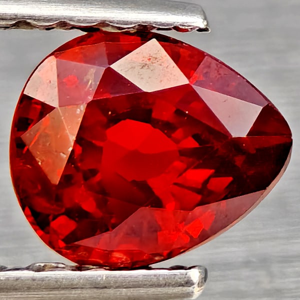 Natural Orangish Red Spessartine Garnet Gemstones 0.96 Ct. Pear Shape 6 x 5.1 Mm.: Product ID: 802937359 Product Name: Natural Garnet Weight: 0.96 CT. Size: 6 x 5.1 x 3.5 MM. Shape: Pear Shape Color: Orangish Red Clarity:SI1 Luster: Good Gems Origin: Namibia Treatment: Unheated Crys