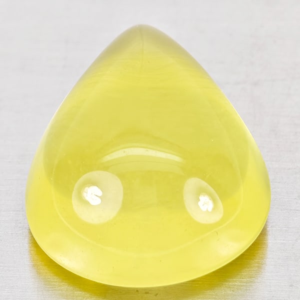 Natural Yellow Lemon Quartz Gemstones 11.04 Ct. Pear Cabochon Shape 16.9 x 13.3 Mm.: Product ID: 805530079 Product Name: Natural Quartz Weight: 11.04 CT. Size: 16.9 x 13.3 x 8.2 MM. Shape: Pear Cabochon Color: Yellow Clarity:None Luster: Good Gems Origin: Brazil Treatment: Unheated Cr