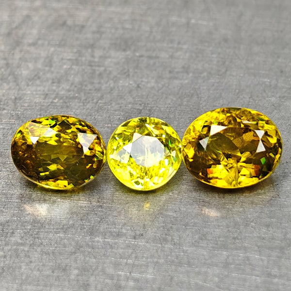 Natural Intense Yellow Green Titanium Red Spark Sphene Gemstones 0.99 Ct.3 Pcs Mixed Shape Mixed: Product ID: 806509031 Product Name: Natural Sphene Weight: 0.99 CT. Size: 4.9 x 4 x 2.6 to 3.7 x 3.6 x 2.1 MM. Shape: Mixed Shape Color: Intense Yellow Green With Red Spark Clarity:SI1 Luster: Good Ge