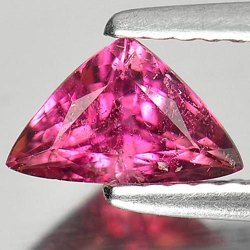 Natural Pink Tourmaline Gemstones 0.66 Ct. Trilliant Shape 7.8 x 5 Mm.: Product ID: 807246848 Product Name: Natural Tourmaline Weight: 0.66 CT. Size: 7.8 x 5 x 3.8 MM. Shape: Trilliant Color: Pink Clarity:VSI Luster: Good Gems Origin: Nigeria Treatment: Unheated Crystal S