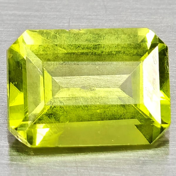 Natural Green Peridot Gemstones 1.42 Ct. Octagon Shape 8 x 6.3 Mm.: Product ID: 805317196 Product Name: Natural Peridot Weight: 1.42 CT. Size: 8 x 6.3 x 3.6 MM. Shape: Octagon Shape Color: Green Clarity:SI1 Luster: Good Gems Origin: Pakistan Treatment: Unheated Crysta