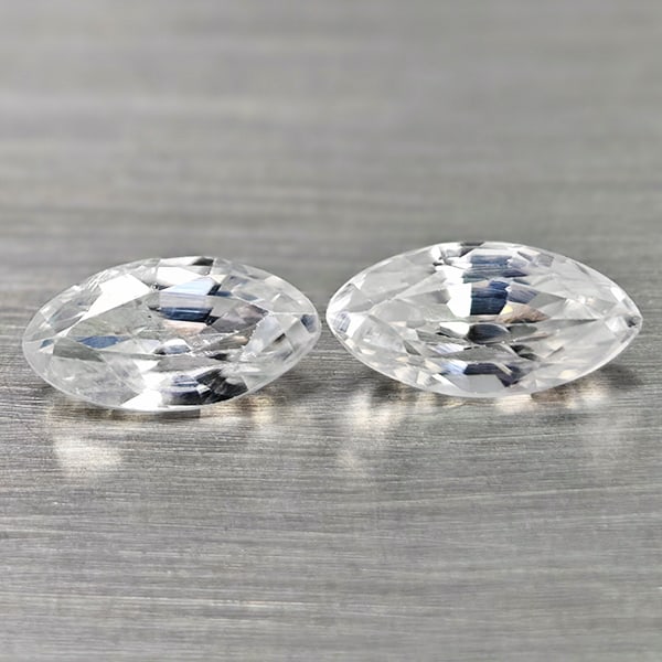 Natural White Color Zircon Gemstones 1.36 Ct. 2 Pcs. Marquise Shape 7.3 x 3.7 Mm.: Product ID: 807742938 Product Name: Natural Zircon Weight: 1.36 CT. Size: 7.3 x 3.7 x 3.1 MM. Shape: Marquise Color: White Clarity:VSI Luster: Good Gems Origin: Cambodia Treatment: Heated Crystal Stru