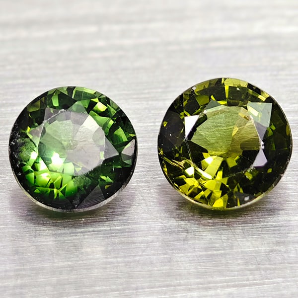 Natural Green Tourmaline Gemstones 1.10 Ct. 2 Pcs. Round Shape 5.1 Mm.: Product ID: 807250739 Product Name: Natural Tourmaline Weight: 1.10 CT. Size: 5.1 x 5.1 x 3.3 MM. Shape: Round Color: Green Clarity:VSI Luster: Good Gems Origin: Nigeria Treatment: Unheated Crystal St
