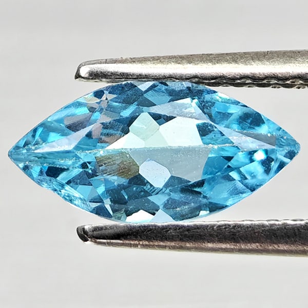 Natural Swiss Blue Topaz Gemstones 1.03 Ct. Marquise Shape 10 x 5 Mm.: Product ID: 807168174 Product Name: Natural Blue Topaz Weight: 1.03 CT. Size: 10 x 5 x 3.2 MM. Shape: Marquise Shape Color: Swiss Blue Clarity:VSI Luster: Good Gems Origin: Brazil Treatment: Treated C