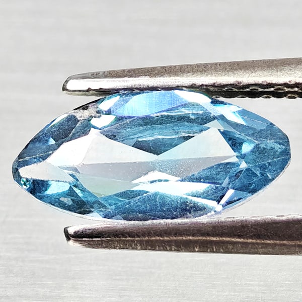 Natural Swiss Blue Topaz Gemstones 1.08 Ct. Marquise Shape 9.6 x 4.8 Mm.: Product ID: 807168203 Product Name: Natural Blue Topaz Weight: 1.08 CT. Size: 9.6 x 4.8 x 3 MM. Shape: Marquise Shape Color: Swiss Blue Clarity:VSI Luster: Good Gems Origin: Brazil Treatment: Treated 