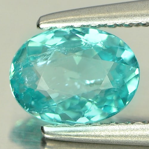 Natural Paraiba Color Apatite Gemstones 0.71 Ct. Oval Shape 6.6 x 5 Mm.: Product ID: 800606210 Product Name: Natural Apatite Weight: 0.71 CT. Size: 6.6 x 5 x 3 MM. Shape: Oval Color: Neon Blue Clarity:SI Luster: Good Gems Origin: Tanzania Treatment: Unheated Crystal Struct