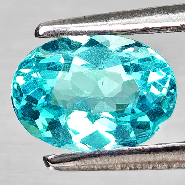 Natural Paraiba Color Apatite Gemstones 0.82 Ct. Oval Shape 6.9 x 5 Mm.: Product ID: 800613696 Product Name: Natural Apatite Weight: 0.82 CT. Size: 6.9 x 5 x 3.5 MM. Shape: Oval Color: Neon Blue Clarity:VSI Luster: Good Gems Origin: Tanzania Treatment: Unheated Crystal Str