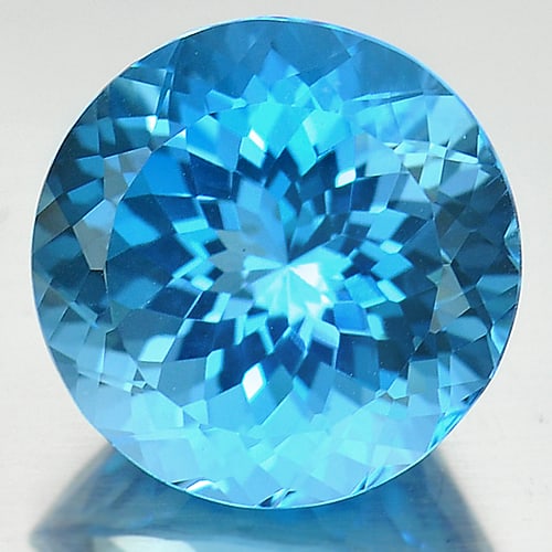 Natural Swiss Blue Topaz Gemstones 14.45 Ct. Round Cornflower Cut: Product ID: 807166766 Product Name: Natural Blue Topaz Weight: 14.45 CT. Size: 14.8 x 14.8 x 10 MM. Shape: Round Color: Blue Clarity:IF Luster: Good Gems Origin: Brazil Treatment: Treated Crystal Stru