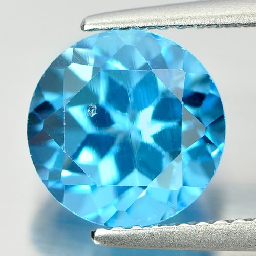 Natural Swiss Blue Topaz Gemstones 3.67 Ct. Round Shape 9 Mm.: Product ID: 807155806 Product Name: Natural Blue Topaz Weight: 3.67 CT. Size: 9 x 9 x 6.5 MM. Shape: Round Color: Swiss Blue Clarity:VSI Luster: Good Gems Origin: Brazil Treatment: Treated Crystal Str
