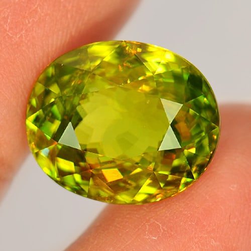 Natural Multi Color Sphene Gemstones 13.73 Ct. Oval 15.7 x 13.2 Mm.: Product ID: 806507452 Product Name: Natural Sphene Weight: 13.73 CT. Size: 15.7 x 13.2 x 8.4 MM. Shape: Oval Color: Multi Color Clarity:VVS Luster: Adamantine Gems Origin: Madagascar Treatment: Unheat