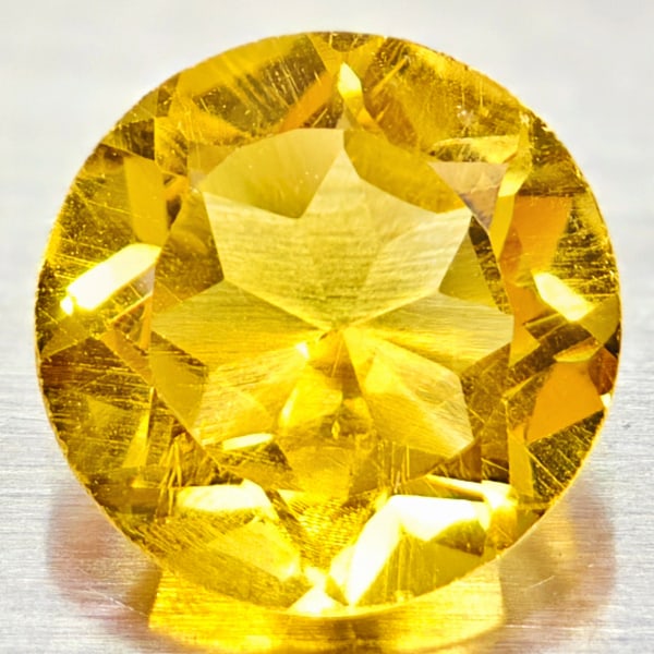 Natural Yellow Citrine Gemstones 1.13 Ct. VVS Round Shape 7 Mm.: Product ID: 801813557 Product Name: Natural Citrine Weight: 1.13 CT. Size: 7 x 7 x 4.2 MM. Shape: Round Color: yellow Clarity:VVS Luster: Good Gems Origin: Barzil Treatment: Unheated Crystal Structure