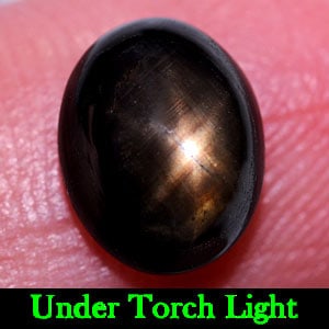 Natural Black Star Sapphire 6 Rays Gemstones 2.89 Ct. Oval Cabochon Shape 8.8 x 7.1 Mm.: Product ID: 806135984 Product Name: Natural Star Sapphire Weight: 2.89 CT. Size: 8.8 x 7.1 x 4.3 MM. Shape: Oval Cabochon Color: Black Clarity:Opaque Luster: Good 6 Rays Star Gems Origin: Thailand Tre