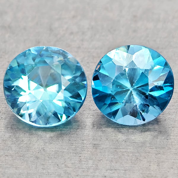 Natural Blue Zircon Gemstones 1.17 Ct. 2 Pcs Round Diamond Cut 4.9 Mm.: Product ID: 807743051 Product Name: Natural Zircon Weight: 1.17 CT. Size: 4.9 x 4.9 x 2.8 MM. Shape: Round Diamond Cut Color: Blue Clarity:VSI Luster: Good Gems Origin: Cambodia Treatment: Heated Crys