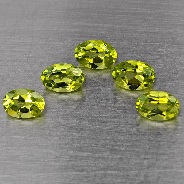 Natural Green Peridot Gemstones 2.90 Ct. 5 Pcs Oval Shape 6.2 x 4.2 Mm.: Product ID: 805317735 Product Name: Natural Peridot Weight: 2.90 CT. Size: 6.2 x 4.2 x 3.4 MM. Shape: Oval Shape Color: Green Clarity:VSI Luster: Good Gems Origin: Pakistan Treatment: Unheated Crystal