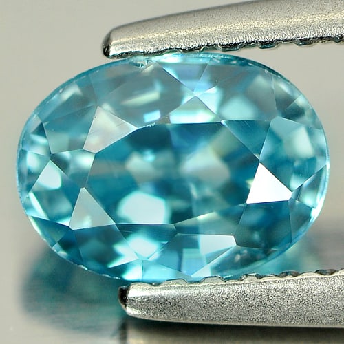 Natural Blue Zircon Gemstones 1.48 Ct. Oval Shape 7 x 5.2 Mm.: Product ID: 807721568 Product Name: Natural Zircon Weight: 1.48 CT. Size: 7 x 5.2 x 3.9 MM. Shape: Oval Color: Blue Clarity:VVS Luster: Good Gems Origin: Cambodia Treatment: Heated Crystal Structure: 