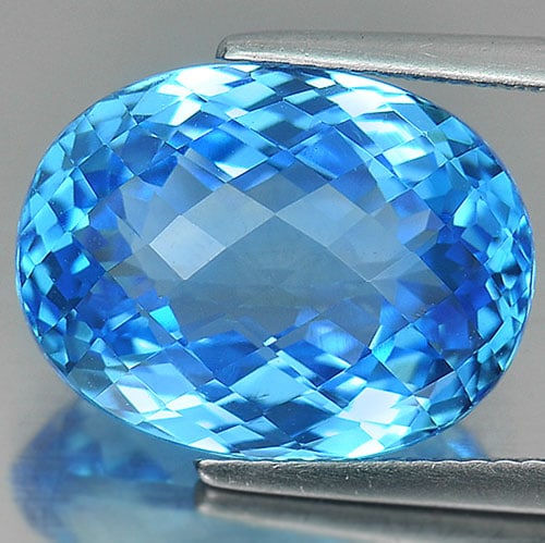 Natural Swiss Blue Topaz Gemstones 13.93 Ct. Clean Oval Checkerboard Cut 16 x 12 Mm.: Product ID: 807165854 Product Name: Natural Blue Topaz Weight: 13.93 CT. Size: 16 x 12 x 9.2 MM. Shape: Oval Checkerboard Color: Blue Clarity:IF Luster: Very Good Gems Origin: Brazil Treatment: Treate
