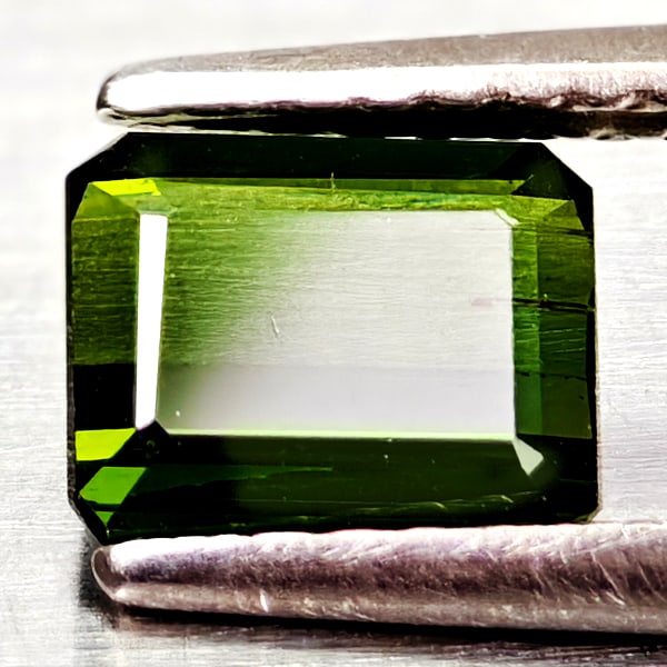 Natural Green Tourmaline Gemstones 0.90 Ct. Octgon Shape 6.4 x 5.2 Mm.: Product ID: 807250864 Product Name: Natural Tourmaline Weight: 0.90 CT. Size: 6.4 x 5.2 x 2.8 MM. Shape: Octagon Color: Green Clarity:VSI Luster: Good Gems Origin: Nigeria Treatment: Unheated Crystal 
