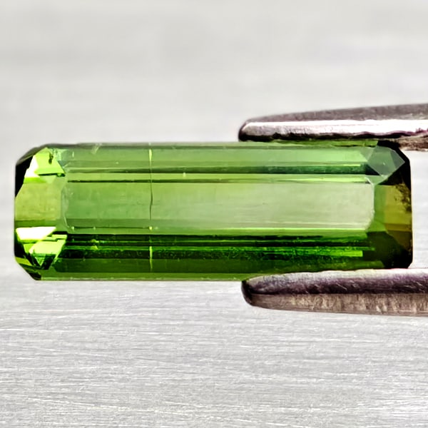 Natural Green Tourmaline Gemstones 0.99 Ct. Octagon Shape 10.3 x 3.7 Mm.: Product ID: 807250927 Product Name: Natural Tourmaline Weight: 0.99 CT. Size: 10.3 x 3.7 x 2.7 MM. Shape: Octagon Color: Green Clarity:VVS - VSI Luster: Very Good Gems Origin: Nigeria Treatment: Unhea