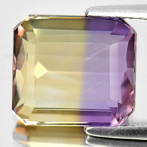 Natural Bi Color Ametrine Gemstones 5.87 Ct. Clean Octagon Shape 11.5 x 10.3 Mm.: Product ID: 800407540 Product Name: Natural Ametrine Weight: 5.87 CT. Size: 11.5 x 10.3 x 5.9 MM. Shape: Octagon Color: Bi-Color Clarity:IF Luster: Very Good Gems Origin: Bolivia Treatment: Unheated C