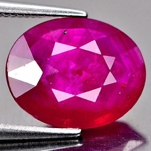 Natural Purplish Red Ruby Gemstones 4.70 Ct. Oval Shape 12.3 x 9.9 Mm.: Product ID: 805931200 Product Name: Natural Ruby Weight: 4.70 CT. Size: 12.3 x 9.9 x 4.2 MM. Shape: Oval Color: Purplish Red Clarity:SI1 Luster: Good Gems Origin: Madagascar Treatment: Heated (Lead-gl
