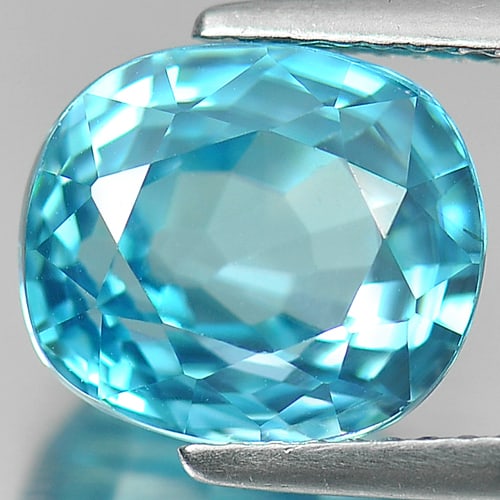 Natural Blue Zircon Gemstones 7.22 Ct. VVS Cushion Shape 10.4 x 9.1 Mm.: Product ID: 807727461 Product Name: Natural Zircon Weight: 7.22 CT. Size: 10.4 x 9.1 x 6.5 MM. Shape: Cushion Color: Blue Clarity:VVS Luster: Very Good Gems Origin: Cambodia Treatment: Heated Crystal 