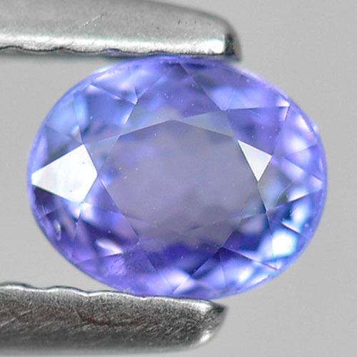 Natural Blue Tanzanite Gemstones 0.56 Ct. Oval Shape 5.2 x 4.2 Mm.: Product ID: 807007687 Product Name: Natural Tanzanite Weight: 0.56 CT. Size: 5.2 x 4.2 x 3.2 MM. Shape: Oval Color: Violetish Blue Clarity:VSI Luster: Good Gems Origin: Tanzania Treatment: Heated Crys