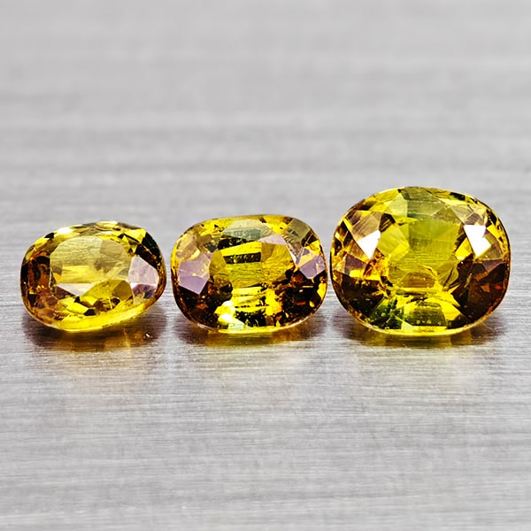 Natural Yellow Sapphire Gemstones 1.14 Ct. 3 Pcs Mixed Shape Mixed Size: Product ID: 806161994 Product Name: Natural Yellow Sapphire Weight: 1.14 CT. Size: 5.1 x 4.3 x 2.7 MM. Shape: Mixed Shape Color: Yellow Clarity:VSI Luster: Good Gems Origin: Thailand Treatment: Heated