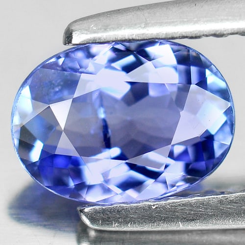Natural Blue Tanzanite Gemstones 0.98 Ct. Oval Shape 7.40 x 5.47 Mm.: Product ID: 807005527 Product Name: Natural Tanzanite Weight: 0.98 CT. Size: 7.40 x 5.47 x 3.21 MM. Shape: Oval Color: Blue Clarity:VSI Luster: Good Gems Origin: Tanzania Treatment: Heated Crystal Str