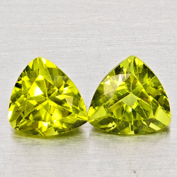 Natural Green Peridot Gemstones 1.42 Ct. 2 Pcs Trilliant Shape 6 Mm.: Product ID: 805317518 Product Name: Natural Peridot Weight: 1.42 CT. Size: 6 x 6 x 3.4 MM. Shape: Trilliant Color: Green Clarity:SI1 Luster: Good Gems Origin: Pakistan Treatment: Unheated Crystal Stru